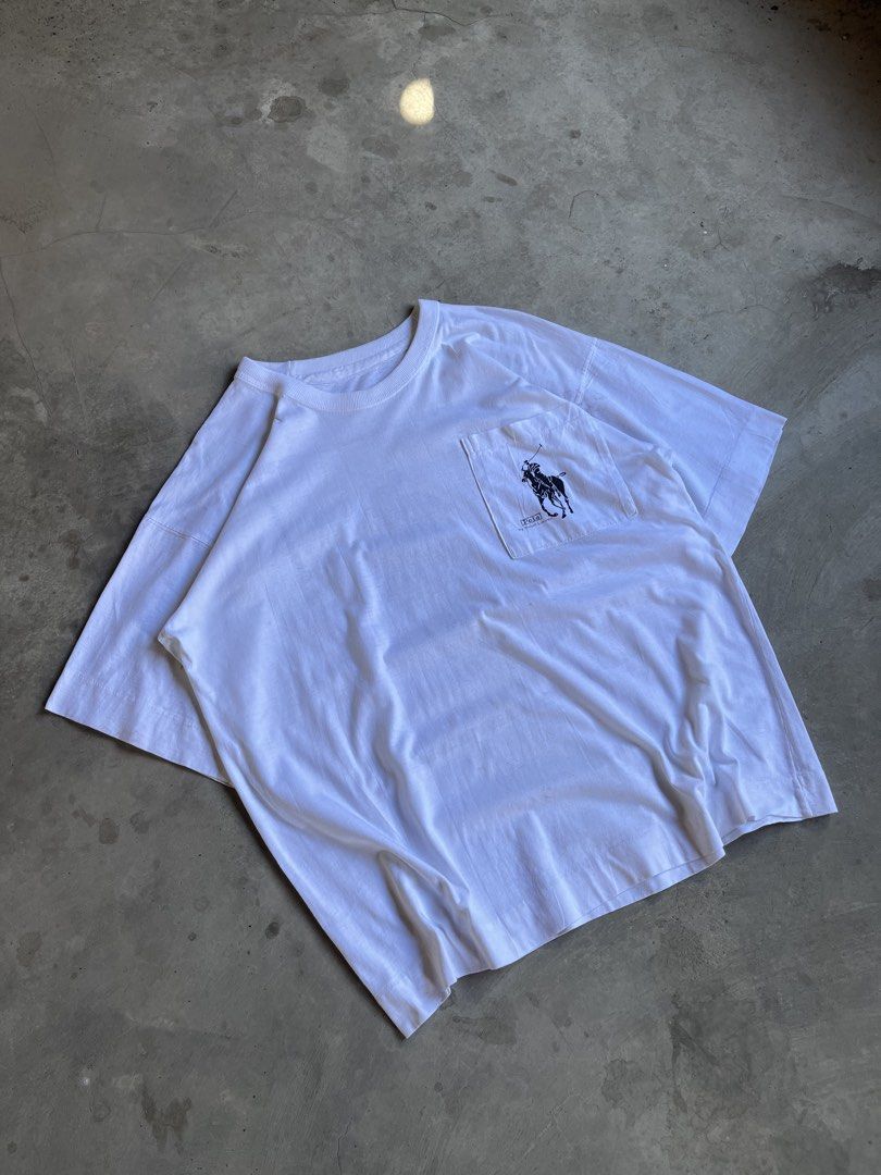Vintage Bootleg Ralph Lauren Pocket tee (Category: Tshirts & Polo Shirts ) located in Cabuyao City. Submitted by jam_mandilag (Listing ID 1448320745, Image 3). Description: Width:20.5 Length:25 Boxy fittings Tag: none Size: medium Color Rate: 8/10 Condition: 8/10 Issue: stain Mode of payment: Gcash Mode of shipping: J&T and lalamove For more information kindly click the “send message button” and other details of the item. Location: cabuyao laguna