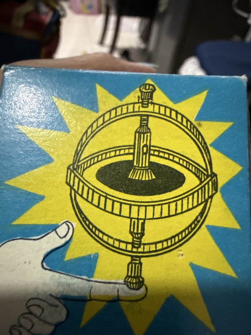 Vintage Spinning Top Toy with Box (Category: Vintage Collectibles) located in Manila. Submitted by eicho (Listing ID 1448436209, Image 2). Description: - Cool vintage spinning top toy - Resembles a gyroscope - Includes original box with Japanese writing - Ideal for collectors - Unique desk toy and conversation starter.