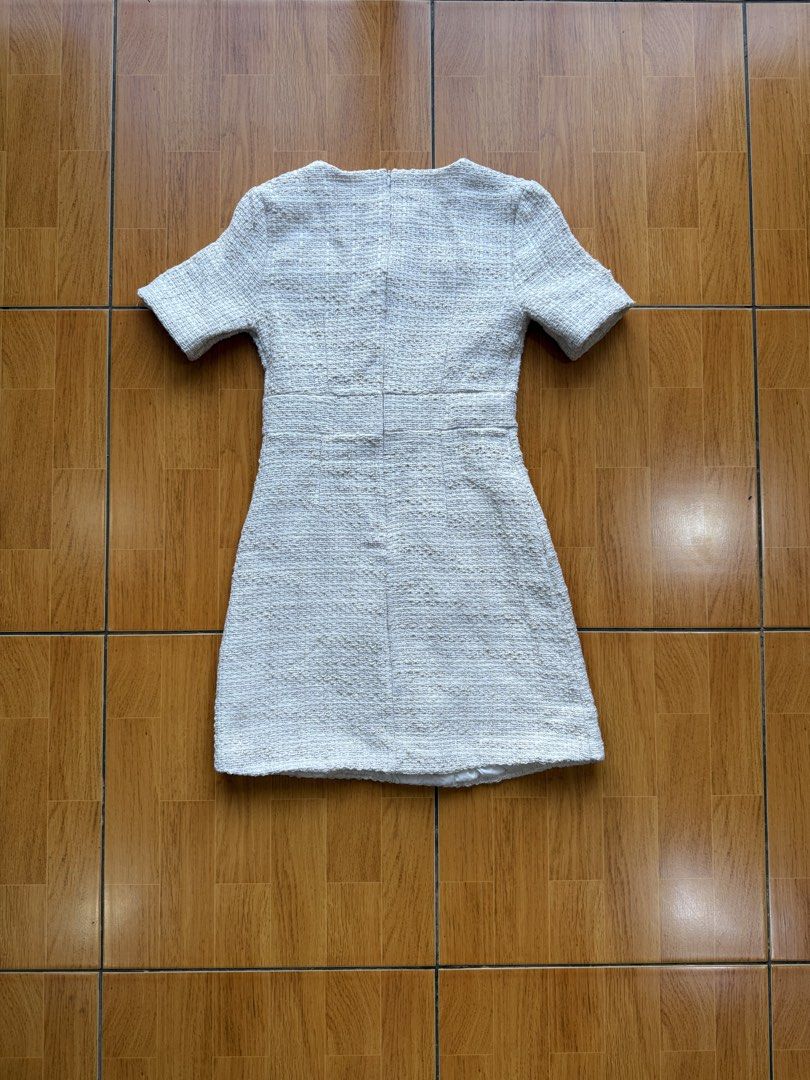 White Tweed Button Front Short Sleeve Mini Dress (Category: Dresses) located in Cebu City. Submitted by hazelcris (Listing ID 1448384432, Image 3). Description: - White tweed mini dress - Short sleeves - Button details down the front - Two pocket details - Zipper closure at the back - Versatile for dressing up or down.