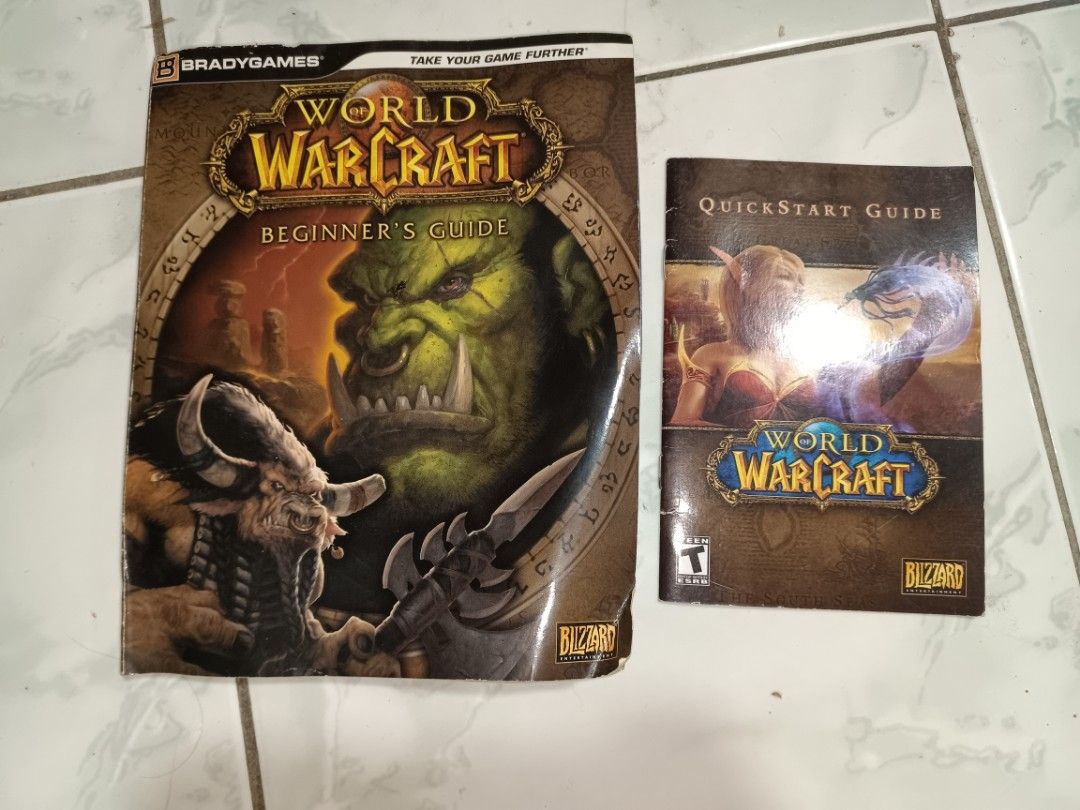 World of Warcraft Beginner's Guide & Quick Start Guide (Category: Storybooks) located in Manila. Submitted by caaths_collection (Listing ID 1448466900, Image 1). Description: - World of Warcraft Beginner's Guide & Quick Start Guide - BradyGames publications - Ideal for new players and collectors - Beginner's Guide features an orc on the cover - Quick Start Guide features a night elf - Includes maps and lore - Essential additions to any WoW collec