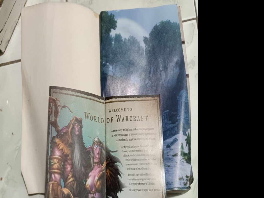 World of Warcraft Beginner's Guide & Quick Start Guide (Category: Storybooks) located in Manila. Submitted by caaths_collection (Listing ID 1448466900, Image 2). Description: - World of Warcraft Beginner's Guide & Quick Start Guide - BradyGames publications - Ideal for new players and collectors - Beginner's Guide features an orc on the cover - Quick Start Guide features a night elf - Includes maps and lore - Essential additions to any WoW collec