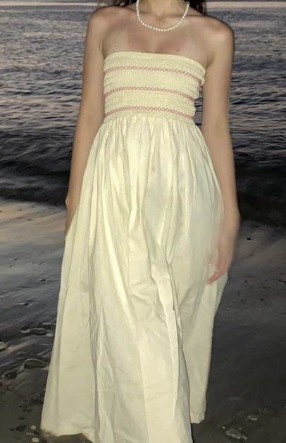 Yellow Smocked Maxi Dress (Category: Dresses) located in Quezon City. Submitted by sy.declutters (Listing ID 1448386524, Image 1). Description: - Adorable yellow maxi dress - Features a smocked bodice with delicate pink embroidery - Flowy and full skirt for a beautiful silhouette - Ideal for beach days, summer evenings, and vacations - Designed for comfort and ease of wear.