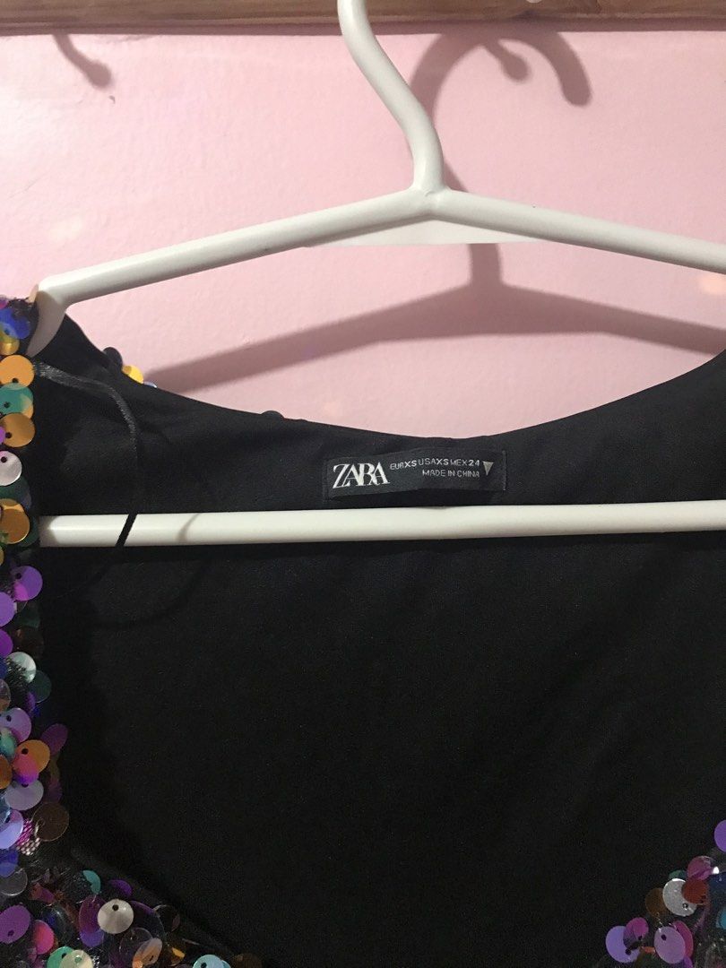 ZARA Sequin Long Sleeve Mini Dress (Category: Dresses) located in Davao. Submitted by jjnvm (Listing ID 1448341465, Image 2). Description: - Used Once - ZARA Sparkly Sequin Mini Dress - Size: XS - Features: Long sleeves, sweetheart neckline - Design: Fun, colorful sequins all over - Occasion: Ideal for parties or a night out - Origin: Made in China.