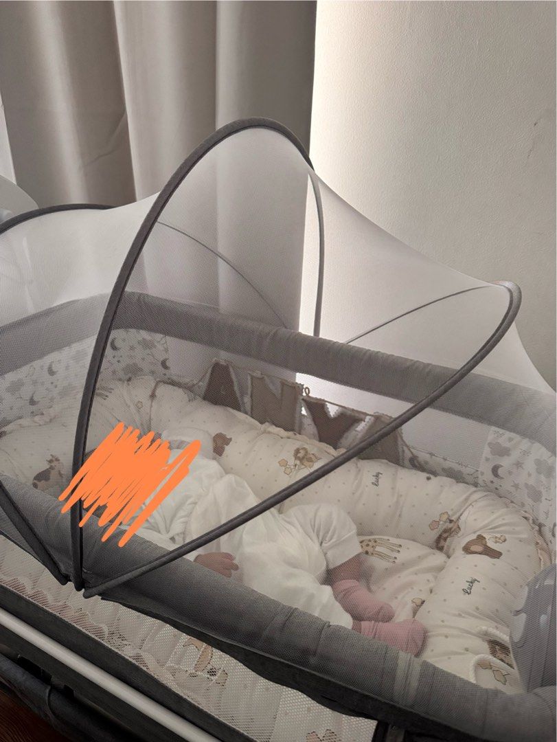AKEeva Sidebed Crib - Good as New (Category: Cots & Cribs) located in Las Pinas. Submitted by sunnyandpeaches (Listing ID 1448550908, Image 2). Description: - AKEeva sidebed crib - Used for less than 2 months - Comes with a mosquito net - Ideal for keeping baby close at night - Features wheels for easy mobility - With light, sound, vibrate toy - Rocking swing - Selling for P6,500.