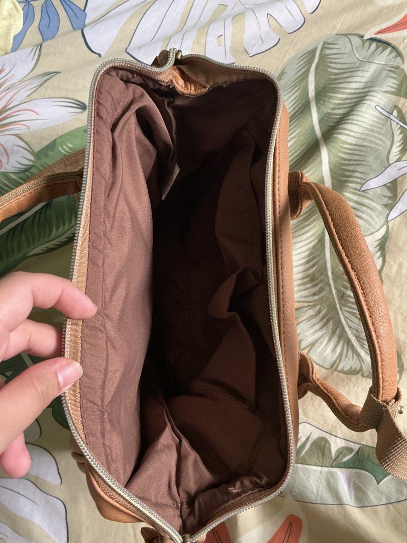 OG BRANDNEW Anello Leather Mini Shoulder Bag (Category: Shoulder Bags) located in Manila. Submitted by eunoia67 (Listing ID 1448512272, Image 3). Description: - Brown faux leather Anello bag - Top handles and detachable shoulder strap - bought from japan 100% og - nawala tag pero kasama pa yon before .