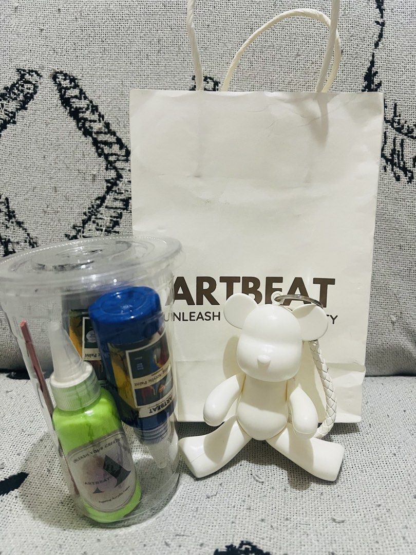 Artbeat Acrylic Paint Set with Bear Keychain (Category: Craft Supplies & Tools) located in Marikina City. Submitted by kzells13 (Listing ID 1448586296, Image 1). Description: - Set of Artbeat acrylic paints - Includes neon green and blue paint bottles - Comes with a brush - Bonus white bear keychain - Artbeat paper bag included - Ideal for art projects or as a gift.