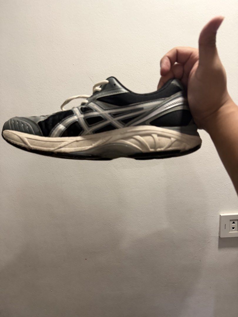 ASICS GT-2000 Running Shoes (Category: Sneakers) located in San Fernando. Submitted by mark88ricing (Listing ID 1448496379, Image 3). Description: - ASICS GT-2000 running shoes - Color: Black and grey with white laces - Versatile: Suitable for running or everyday wear - Condition: Shows some signs of wear on soles and uppers, but plenty of life remaining - Reason for selling: No longer running Negotiable.