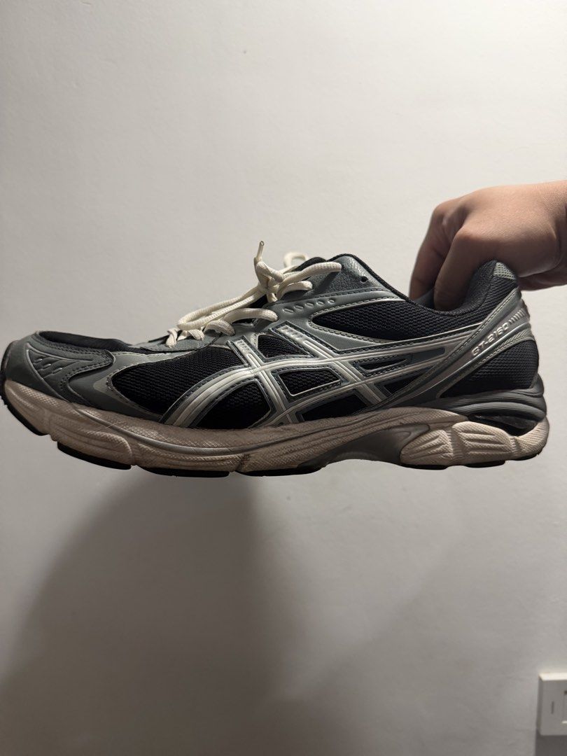 ASICS GT-2000 Running Shoes (Category: Sneakers) located in San Fernando. Submitted by mark88ricing (Listing ID 1448496379, Image 2). Description: - ASICS GT-2000 running shoes - Color: Black and grey with white laces - Versatile: Suitable for running or everyday wear - Condition: Shows some signs of wear on soles and uppers, but plenty of life remaining - Reason for selling: No longer running Negotiable.