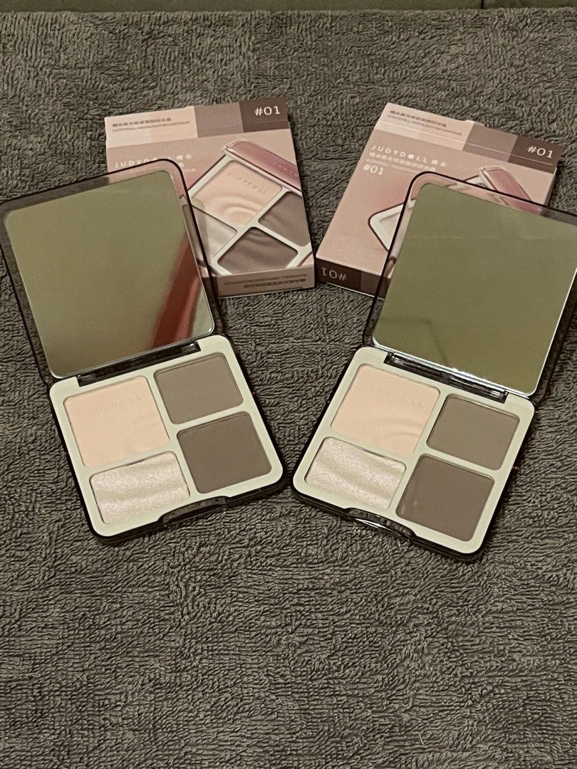 AUTHENTIC JUDYDOLL Contour Palette #01 (Category: Makeup) located in Cavite. Submitted by jedecluttering (Listing ID 1448677421, Image 2). Description: - Original bought from judydoll store - Each palette contains 4 versatile shades: light shimmer, pale pink, medium brown, and dark brown. - Ideal for creating natural eye looks or subtle contouring. - Compact design with a built-in mirror for on-the-go touch-ups. - Both palettes are included in th