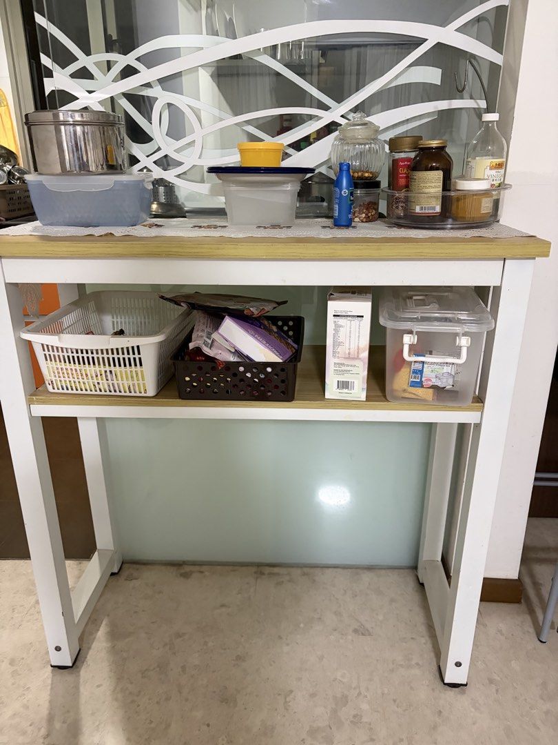 Table (Category: Shelves, Cabinets & Racks) located in Singapore. Submitted by lathamp40796 (Listing ID 1448622940, Image 1). Description: It’s a bar table Dismantle can be done .