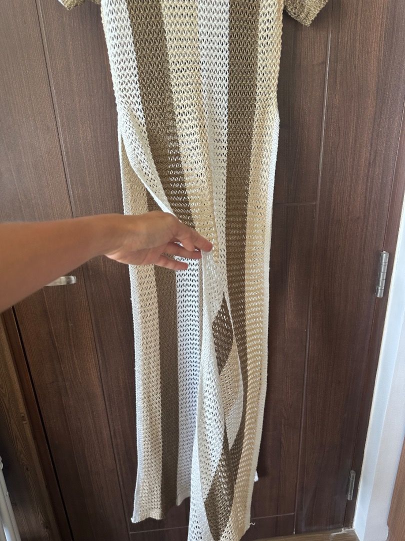 Beach Cover-Up (Category: Dresses) located in Malay. Submitted by joycking (Listing ID 1448548355, Image 3). Description: 🐚 Long beach cover-up with a flattering high slit. 🐚 Perfect for beach days, pool parties, vacations, or resort wear. 🐚 Size on tag: S / M 🐚 Like new. 🐚 open to reasonable offers RFS: Decluttering my wardrobe. .