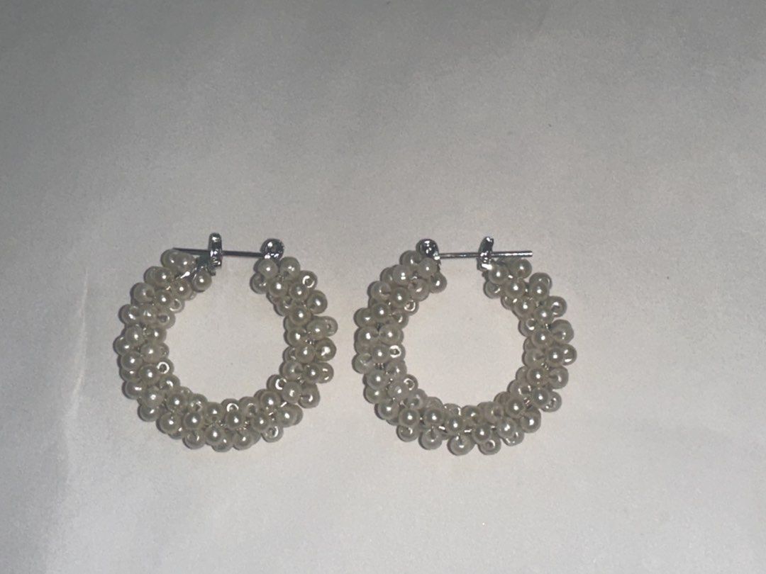Beaded Hoop Earrings (Category: Earrings) located in Manila. Submitted by arahazelnut (Listing ID 1448650309, Image 1). Description: - please manage your expectations -worn once. Most of the time nakatambak nalang sa accessory box -nagdedeclutter to fund my wisdom tooth extraction -shipping cost will be shouldered by the buyer -location: SM Sta. Mesa/LRT V. Mapa station.