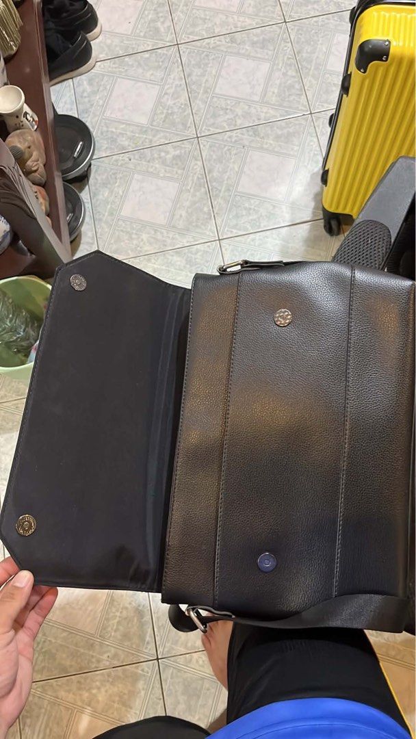 Black Leather sling bag for Men (Category: Luxury Bags & Wallets) located in Quezon City. Submitted by ajroxas7 (Listing ID 1448502992, Image 3). Description: For Sale Hindi na nagagamit, no issue Bagong-bago pa Kasya ang 13inch na iPad Loc: Novaliches, QC.