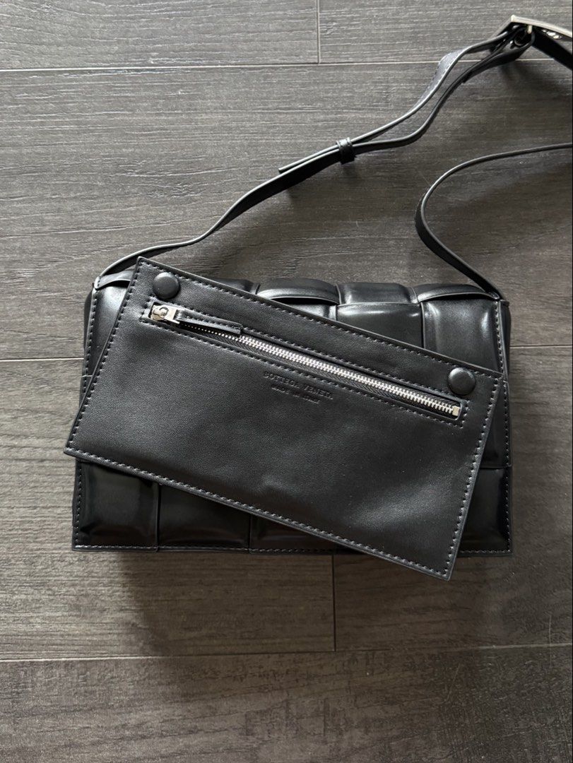 Bottega Veneta Padded Cassette Bag (Category: Sling Bags) located in Quezon City. Submitted by drizzyarchives (Listing ID 1448539334, Image 2). Description: Pre Loved Bottega Veneta Padded Cassette Bag • Black Exterior & Interior 🖤 • Super pristine condition 10/10 (Rank A) 🙌 • Complete Originality Certified Tag ✅ • Serial code ✅ • No issues 💯 • Adjustable Strap ✅ • Silver Buckle 🩶 • Good everyday bag 🧳 Price + SF (same day delivery) ❗️NO LOW
