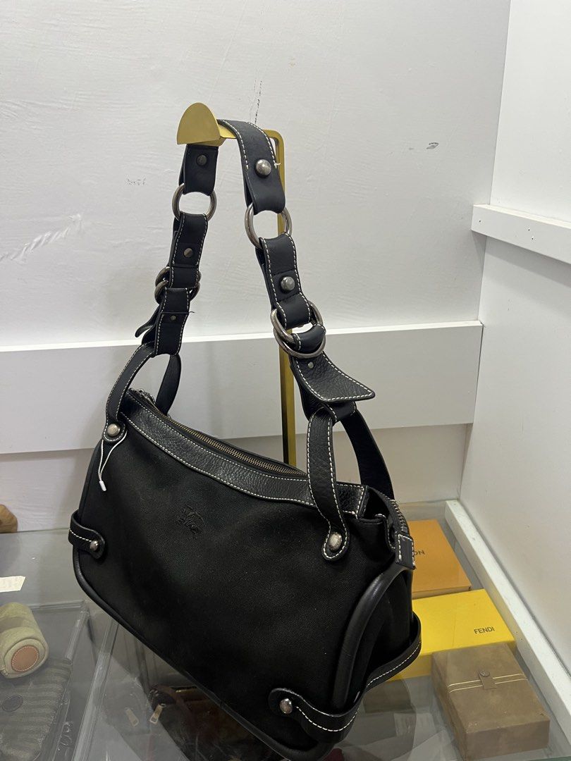 Burberry Canvas Hobo (Category: Luxury Bags & Wallets) located in Cabanatuan. Submitted by cristalyngonzales (Listing ID 1448601501, Image 3). Description: Burberry 💯 canvas / leather hobo bag 5,800 Php Very good cond. minimal usage only (canvas not faded) 🖤.