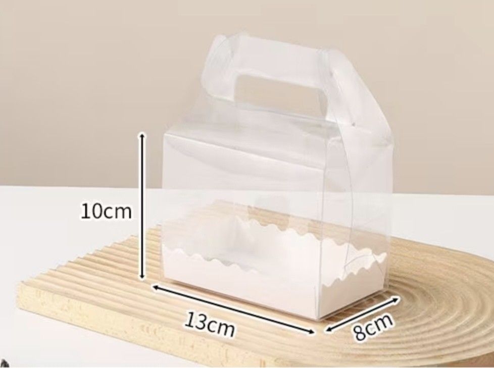 Cake roll rectangular transparent decor box (Category: Bakeware) located in Singapore. Submitted by tian.stickers (Listing ID 1448589721, Image 1). Description: 10 pcs.