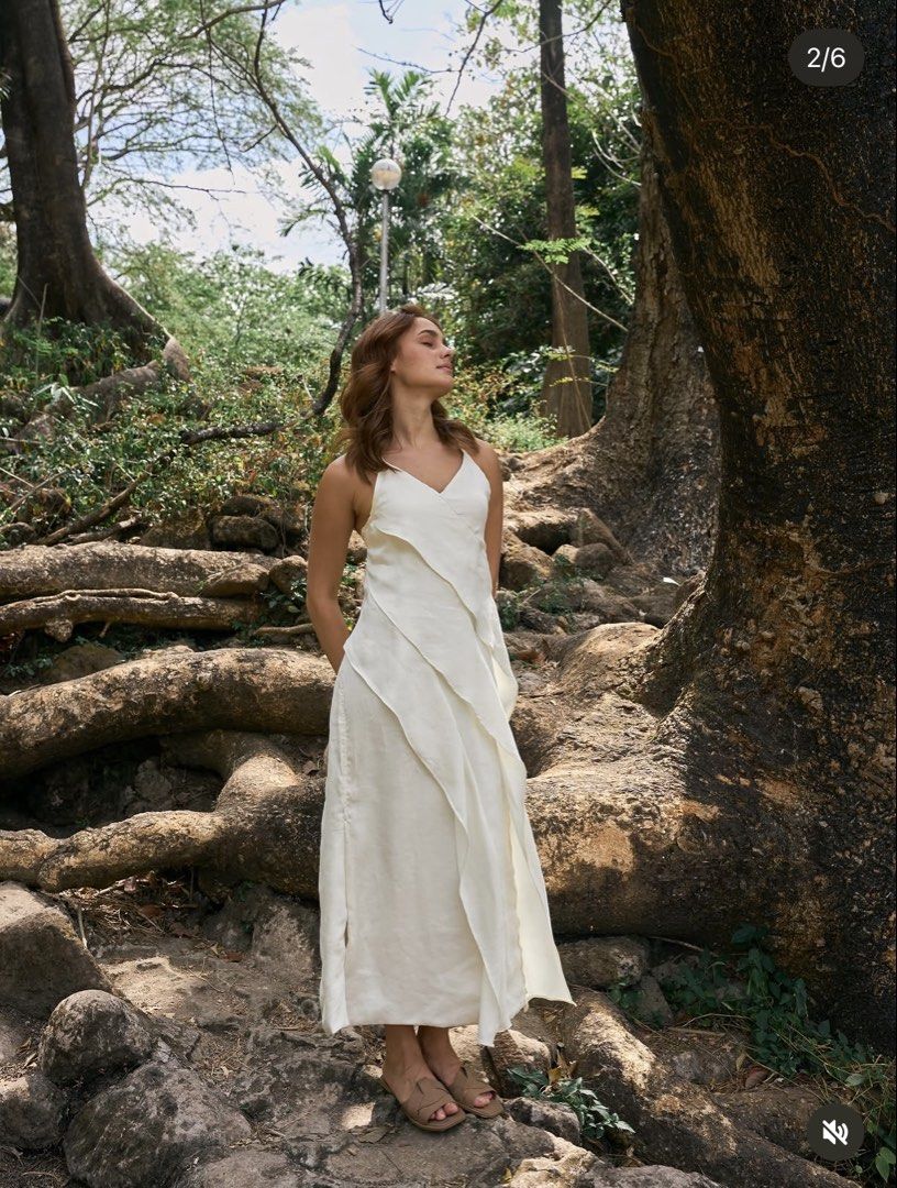 CARIÑO | Jimena Asymmetrical Dress (Category: Dresses) located in Mandaluyong City. Submitted by cartmaxxing (Listing ID 1448540292, Image 1). Description: - Chic flowy white dress - Size: L - Length: Midi - Flattering V-neckline - Straps: Adjustable - Versatile for events or casual wear - Perfect for any occasion - Comfortable and flowy Used only once for my grandma’s 80th bday 🌀 Original price is 4,850php!.