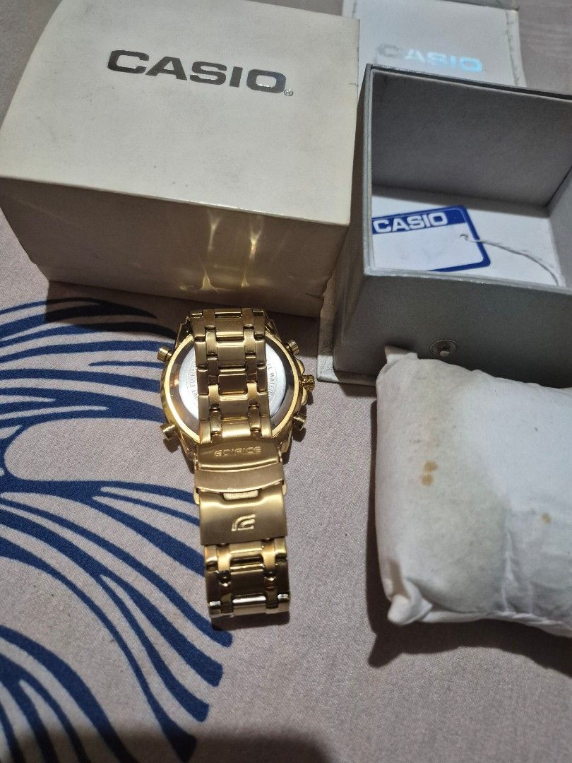 Casio Gold Chronograph Watch with Box (Category: Luxury Watches) located in Manila. Submitted by bravecloud-dcbf6c (Listing ID 1448688888, Image 3). Description: - Authentic Gold Casio Watch - Stylish Chronograph design with multiple dials - Includes original box and tags - Versatile for everyday wear or special events - Sold as is.