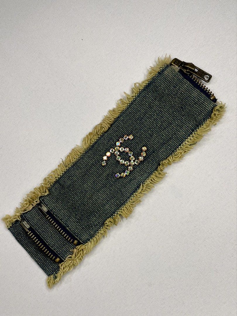 Chanel 01P denim cuff bracelet (Category: Luxury Accessories) located in San Fernando. Submitted by larchivefeminine (Listing ID 1448653917, Image 3). Description: -Chanel 2001 Spring/Summer (01P) collection -blue denim fabric -rhinestone-encrusted CC logo.
