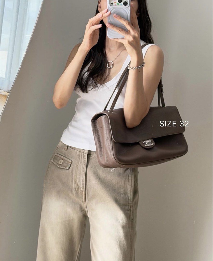Chanel Maxi Flap taupe (Category: Luxury Bags & Wallets) located in Silang. Submitted by girlyouneedthis (Listing ID 1448519205, Image 1). Description: Flash sale today only. Chanel maxi flap in this beautiful grained taupe leather. Microchipped, comes with dustbag only: No returns, No exchange, No refunds..