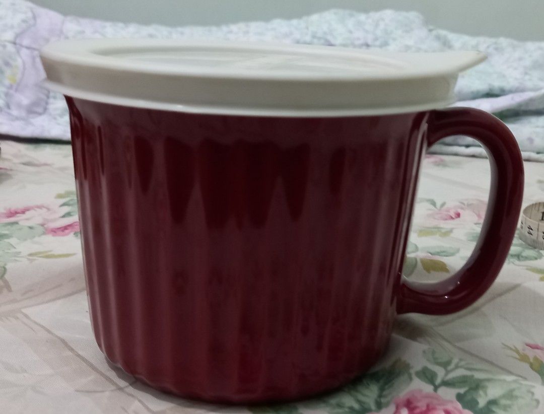 Corning Ware Stoneware Mug with Lid 20oz (Category: Coffee & Tea Tableware) located in Mandaluyong City. Submitted by gantan.tree (Listing ID 1448659609, Image 3). Description: CorningWare meal mug - 20 oz (591 ml) capacity size: height - 4.5" circumference: 14" (below) - 15" (above) - vented white lid - durable stoneware material - microwave & oven safe - ideal for soup, coffee, tea & other beverages - not suitable for stovetop or broiler use **