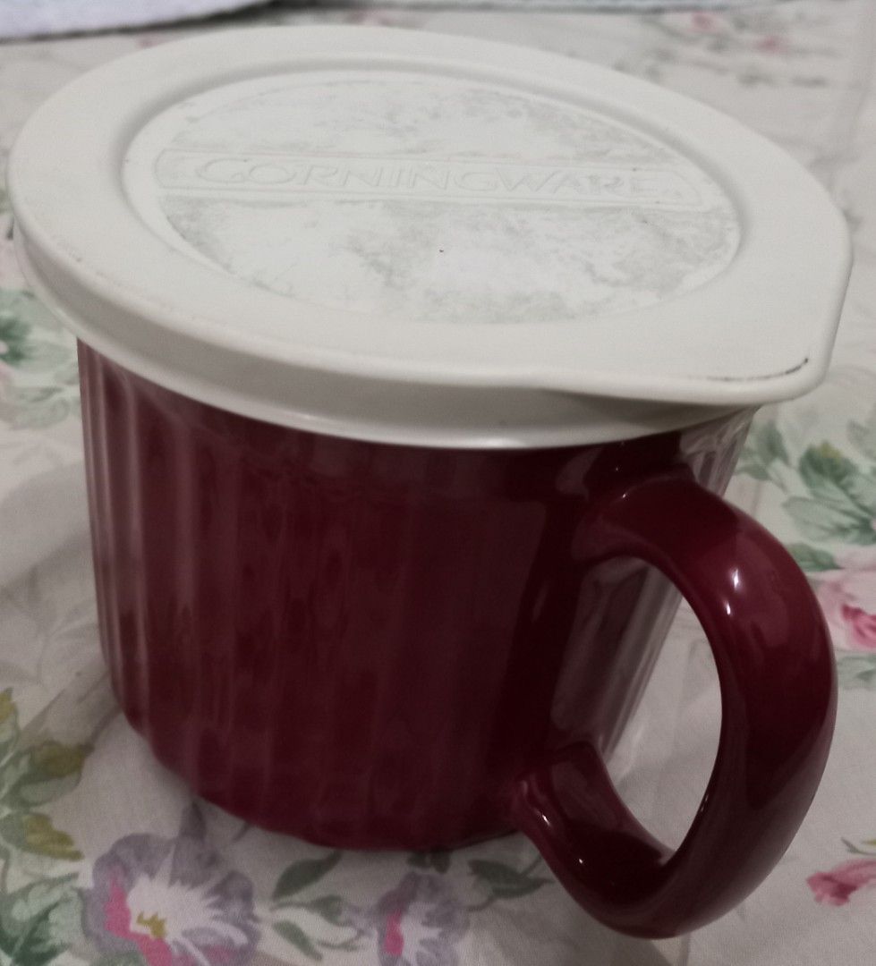 Corning Ware Stoneware Mug with Lid 20oz (Category: Coffee & Tea Tableware) located in Mandaluyong City. Submitted by gantan.tree (Listing ID 1448659609, Image 1). Description: CorningWare meal mug - 20 oz (591 ml) capacity size: height - 4.5" circumference: 14" (below) - 15" (above) - vented white lid - durable stoneware material - microwave & oven safe - ideal for soup, coffee, tea & other beverages - not suitable for stovetop or broiler use **