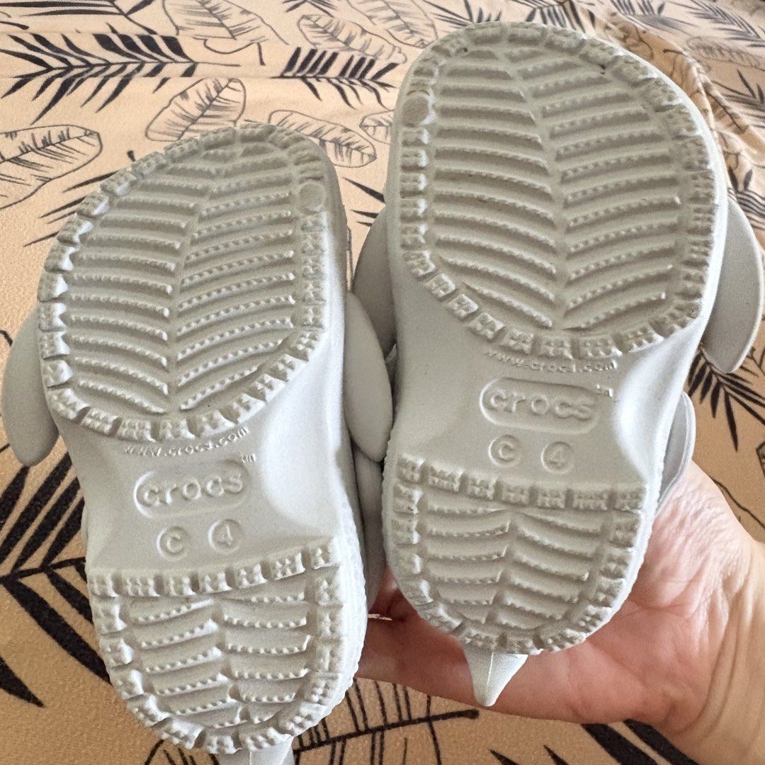 Crocs Toddler Shark Clogs Size 4 White (Category: Babies & Kids Fashion) located in Cavite. Submitted by savannahluish (Listing ID 1448599702, Image 3). Description: - Cute white Crocs clogs for kids - Fun shark fin design - Easy slip-on and off - Perfect for beach or playground - Good grip soles - Size 4.