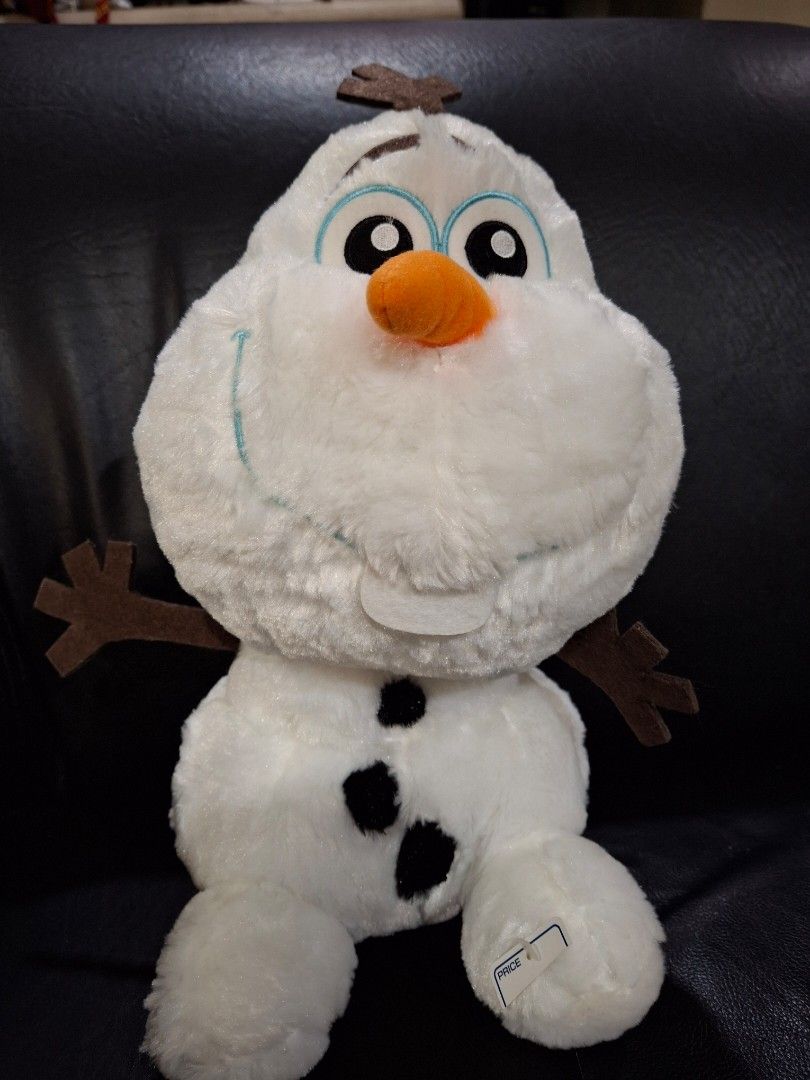 Disney Frozen Olaf Plush Toy (Category: Plushies & Soft Toys) located in Quezon City. Submitted by pure_trinsky (Listing ID 1448532241, Image 1). Description: - Adorable Olaf plush toy from Disney's Frozen - Super soft and cuddly, perfect for hugs! - Features his iconic carrot nose and twig arms - Great for playtime, collecting, or room decor - Approximately 14 inches in length.