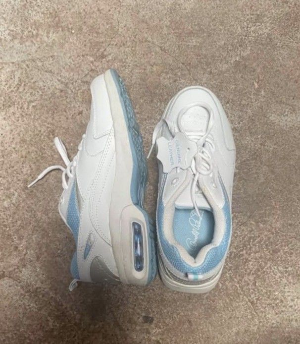 Donald Pliner White Leather Sneakers (Category: Sneakers) located in Quezon City. Submitted by icarlymeow (Listing ID 1448562176, Image 2). Description: - White genuine leather sneakers - Light blue accent details - Lace-up closure - Air cushioning for comfort - Size 7W - Ideal for everyday wear and light activities issues posted. .
