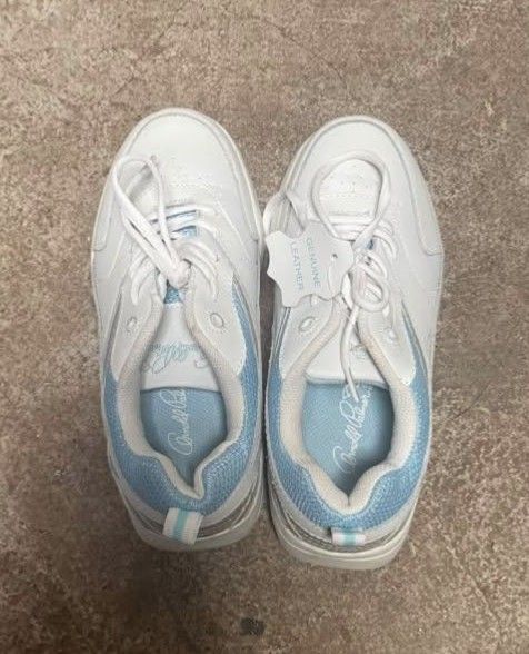 Donald Pliner White Leather Sneakers (Category: Sneakers) located in Quezon City. Submitted by icarlymeow (Listing ID 1448562176, Image 1). Description: - White genuine leather sneakers - Light blue accent details - Lace-up closure - Air cushioning for comfort - Size 7W - Ideal for everyday wear and light activities issues posted. .