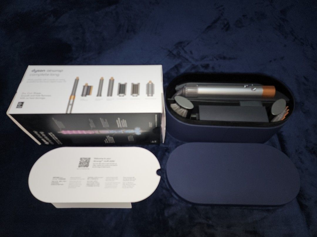 Dyson Airwrap Complete Long Multi-Styler (Category: Hair) located in Paranaque City. Submitted by crystalclear7777 (Listing ID 1448664728, Image 2). Description: originally costs 26K bought from online Sale for 23K selling it now for only 19K. - Dyson Airwrap Complete Long multi-styler and dryer - Includes Coanda smoothing dryer - Comes with 30mm and 40mm long barrels - Features soft and firm smoothing brushes - Includes round volumising brush - 