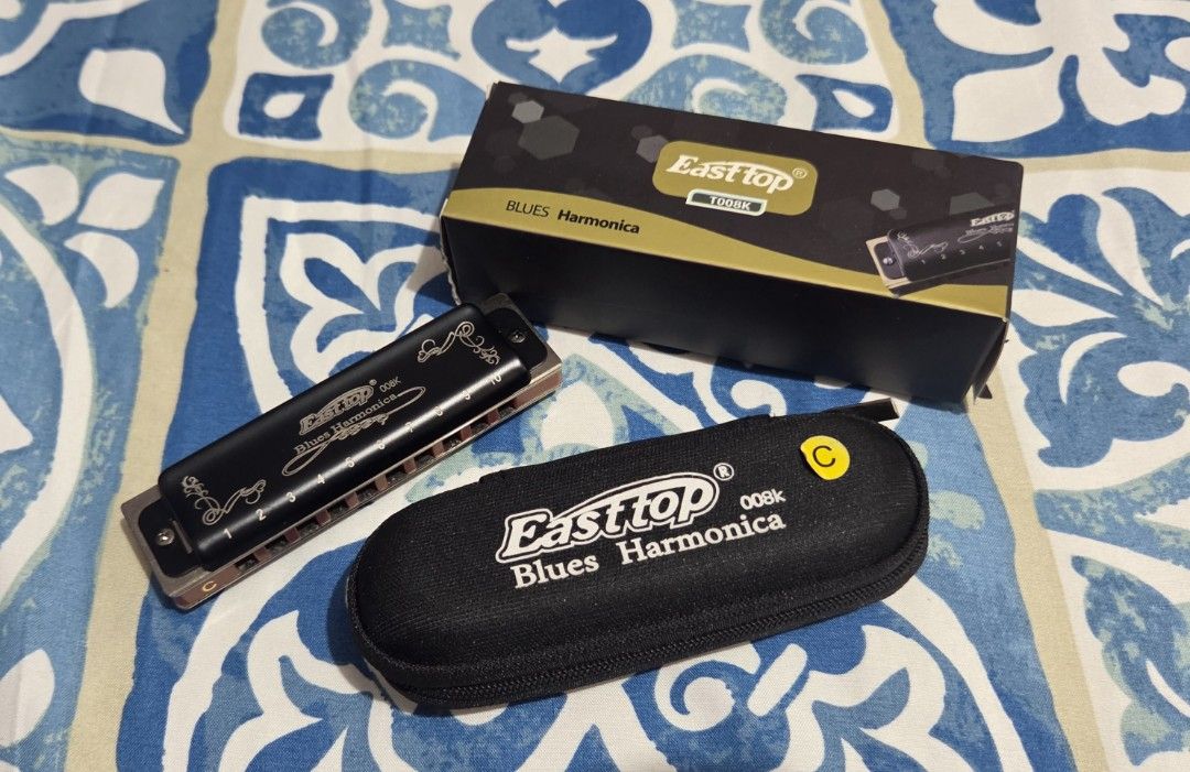 Easttop Blues Harmonica T008K in C (Category: Musical Instruments) located in Dasmarinas. Submitted by youngdeer-bdc6 (Listing ID 1448600389, Image 1). Description: Selling my Easttop 008K Blues Harmonica in Key of C. - Ideal for beginners and experienced players. - Easy to play with a pleasant sound - Comes with protective case and original box. - Already sanitized with alcohol and air dry to remove any previous use, no smell. Issues: None, 9/10
