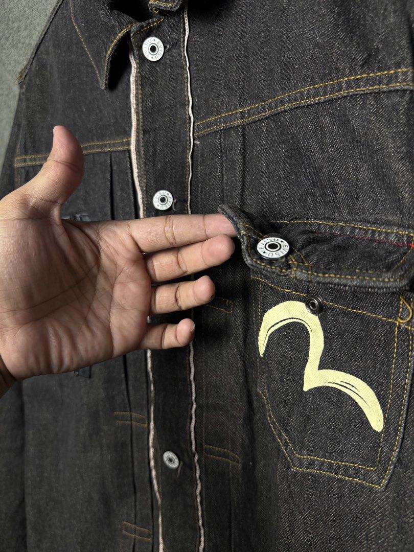For sale authentic evisu denim jacket (Category: Coats, Jackets and Outerwear) located in Taguig. Submitted by thasmallph (Listing ID 1448675618, Image 3). Description: Authentic legit Excellent condition Minimal issue last pic Size medium to large Dimes Width 22 Length 28.