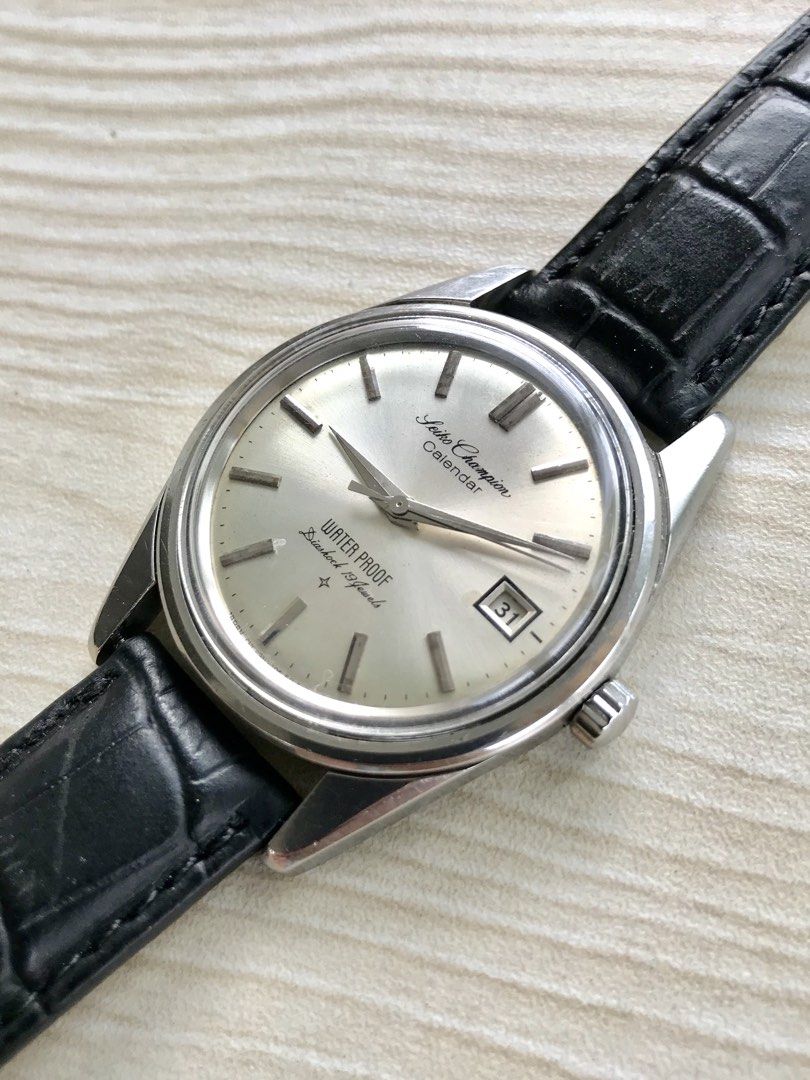 FS: Seiko Champion Calendar Cal 860 (Category: Men's Watches) located in Manila. Submitted by marco_b (Listing ID 1448553464, Image 3). Description: FS: Seiko Champion Calendar Cal 860 “Calibre 860 is a hand-winding movement similar to movement used in Seiko Alpinist” - Reference no.: J13050 - Calibre 860 manual wind - 37mm - Circa 1963 - Plexiglass - All orig watch head - dial, hands and crown - Aftermarket strap Watch only 8.5/10 rating Php 12,