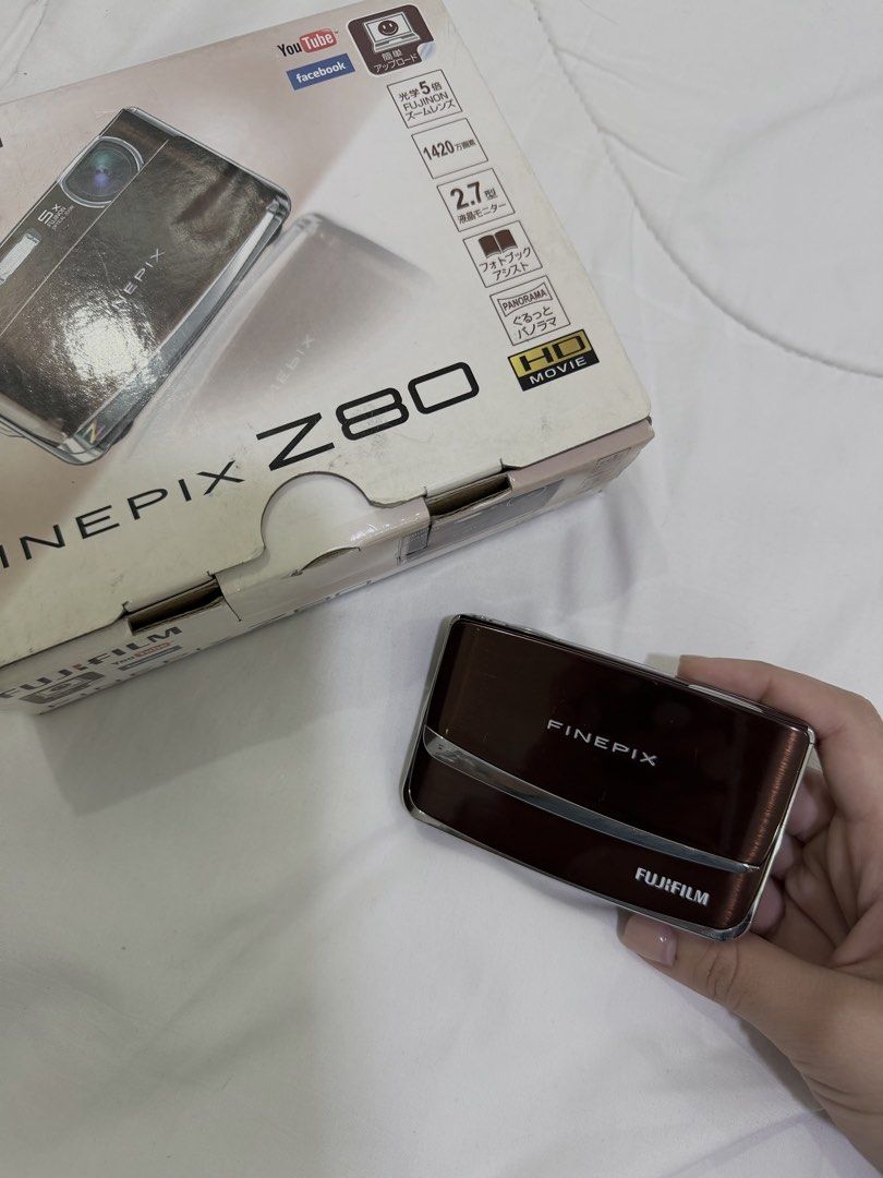 Fujifilm FinePix Z80 DIGICAM / CAMERA / DIGI (Category: Cameras) located in Baliuag. Submitted by ourchives (Listing ID 1448662231, Image 1). Description: INCLUSIONS : • orig box • orig charger • new battery • 2GB SD Card • extra battery charger • some freebies (pouch, cam holder.. etc) • 14.2 MP CCD sensor (known for the classic digicam color rendering) • 5× optical zoom lens • 720p HD video recording • Face Detection •Tracking Autofocus • Motio