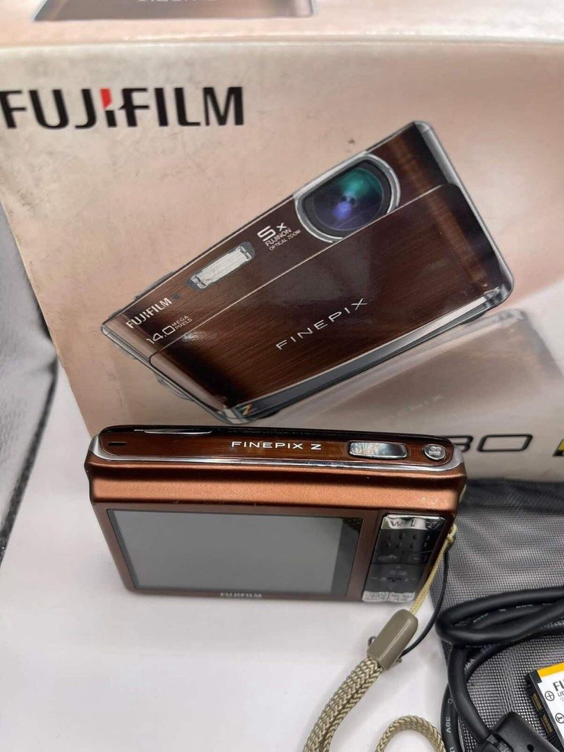Fujifilm FinePix Z80 DIGICAM / CAMERA / DIGI (Category: Cameras) located in Baliuag. Submitted by ourchives (Listing ID 1448662231, Image 2). Description: INCLUSIONS : • orig box • orig charger • new battery • 2GB SD Card • extra battery charger • some freebies (pouch, cam holder.. etc) • 14.2 MP CCD sensor (known for the classic digicam color rendering) • 5× optical zoom lens • 720p HD video recording • Face Detection •Tracking Autofocus • Motio