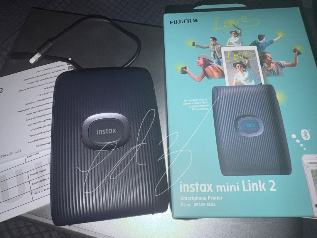 Fujifilm Instax mini Link 2 (Category: Camera Bags & Carriers) located in Makati City. Submitted by everydayedz (Listing ID 1448687280, Image 2). Description: Fujifilm Instax mini Link 2 Bought last March 2024 for 7,299 Selling for 4,900 Sobrang bihira nagamit kaya like new Unit only, box and usb charger NO FILM Rfs: di nagagamit Loc Comembo Taguig J&t or Lalalmove sf/df shoulder by buyer.