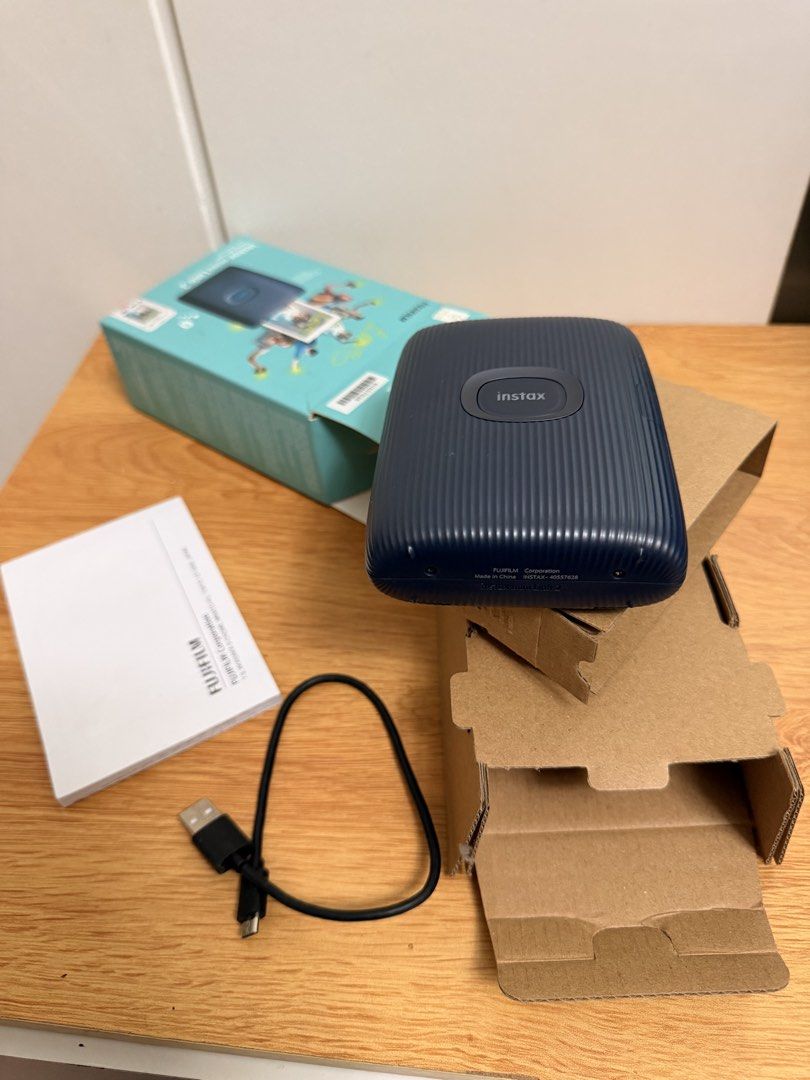 Fujifilm Instax Mini Link 2 Smartphone Printer - Navy Blue (Category: Printers, Scanners & Copiers) located in Manila. Submitted by madeidei (Listing ID 1448505915, Image 1). Description: - Fujifilm Instax Mini Link 2 Smartphone Printer - Color: Navy Blue - Instantly print photos from your smartphone - Includes original box, USB cable, and instruction manual - RFS: Not using. Used only twice..