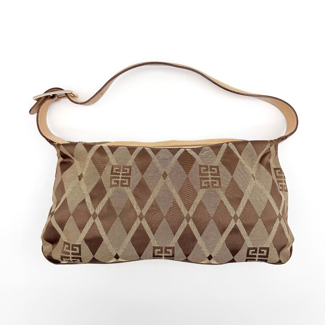 Givenchy 4G Monogram Shoulder Beige/Brown (Category: Accessories) located in Kuala Lumpur. Submitted by elevatedstudios.my (Listing ID 1448681702, Image 1). Description: Authentic Luxury Vintage Items 💎 🪪 SSM / Business Registered ✉️ DM us on Instagram: @elevatedstudios.co 🔗 Website: elevatedstudios.co 🌍 Globally Sourced • Our wallets, bags, and accessories are vintage treasures, carefully sourced from trusted suppliers worldwide to provide c