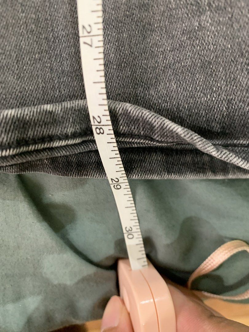 Grey Denim Midi Skirt with Front Slit (Category: Skirts) located in Binan City. Submitted by bentenison (Listing ID 1448568736, Image 2). Description: - Grey denim midi skirt - Features a front slit for easy movement - Belt loops and button closure at the waistband - Functional front and back pockets - Measurements: Waist approx 29 inches, Length approx 27 inches - Perfect staple piece for any wardrobe.