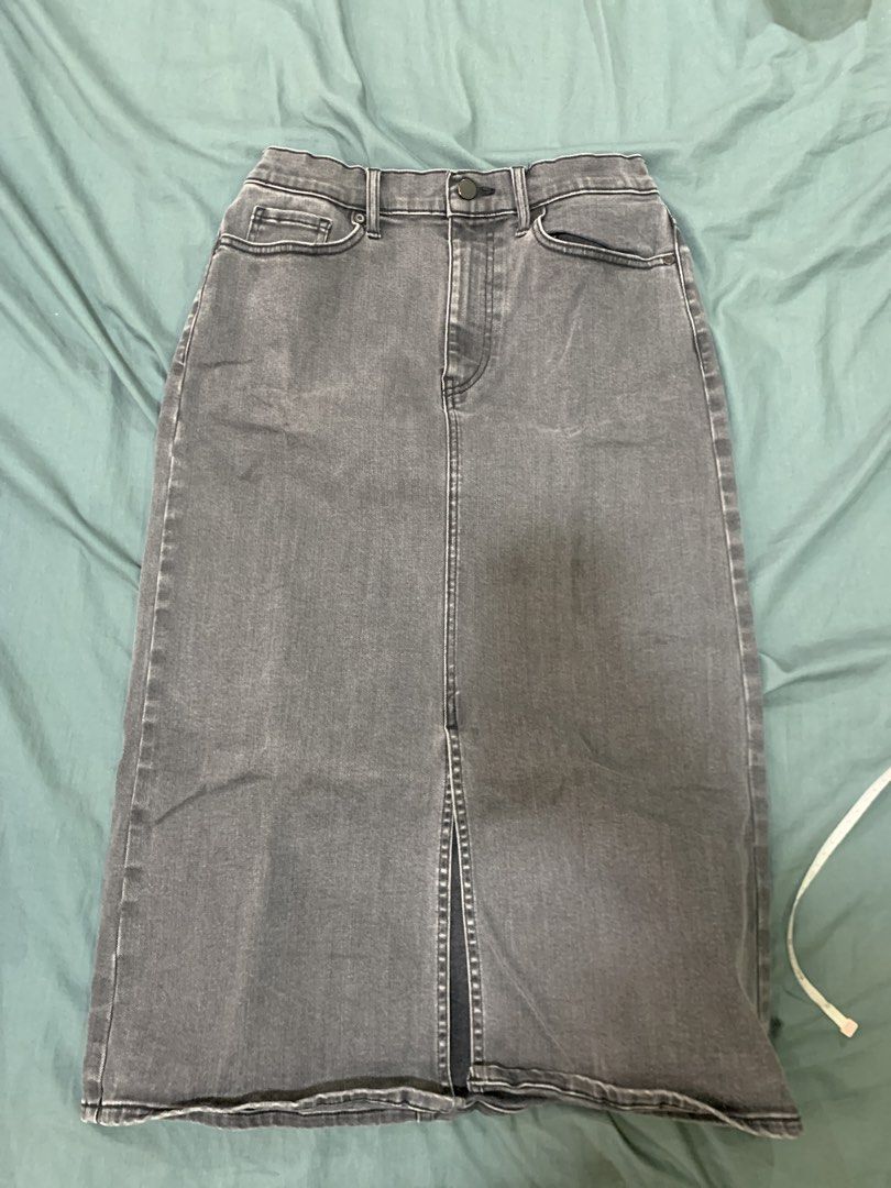 Grey Denim Midi Skirt with Front Slit (Category: Skirts) located in Binan City. Submitted by bentenison (Listing ID 1448568736, Image 1). Description: - Grey denim midi skirt - Features a front slit for easy movement - Belt loops and button closure at the waistband - Functional front and back pockets - Measurements: Waist approx 29 inches, Length approx 27 inches - Perfect staple piece for any wardrobe.