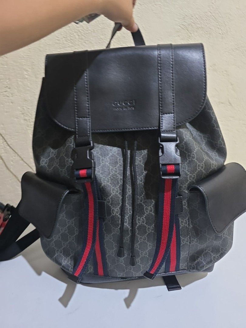 Gucci GG Supreme Monogram Backpack (Category: Luxury Bags & Wallets) located in Batangas. Submitted by venus232nd (Listing ID 1448602420, Image 1). Description: - Gucci backpack - Classic GG Supreme canvas with black leather trim - Drawstring closure under flap with buckle straps - Convenient side pockets - Adjustable padded shoulder straps for comfort - Multiple interior compartments for organization - Serial number visible inside for authentici