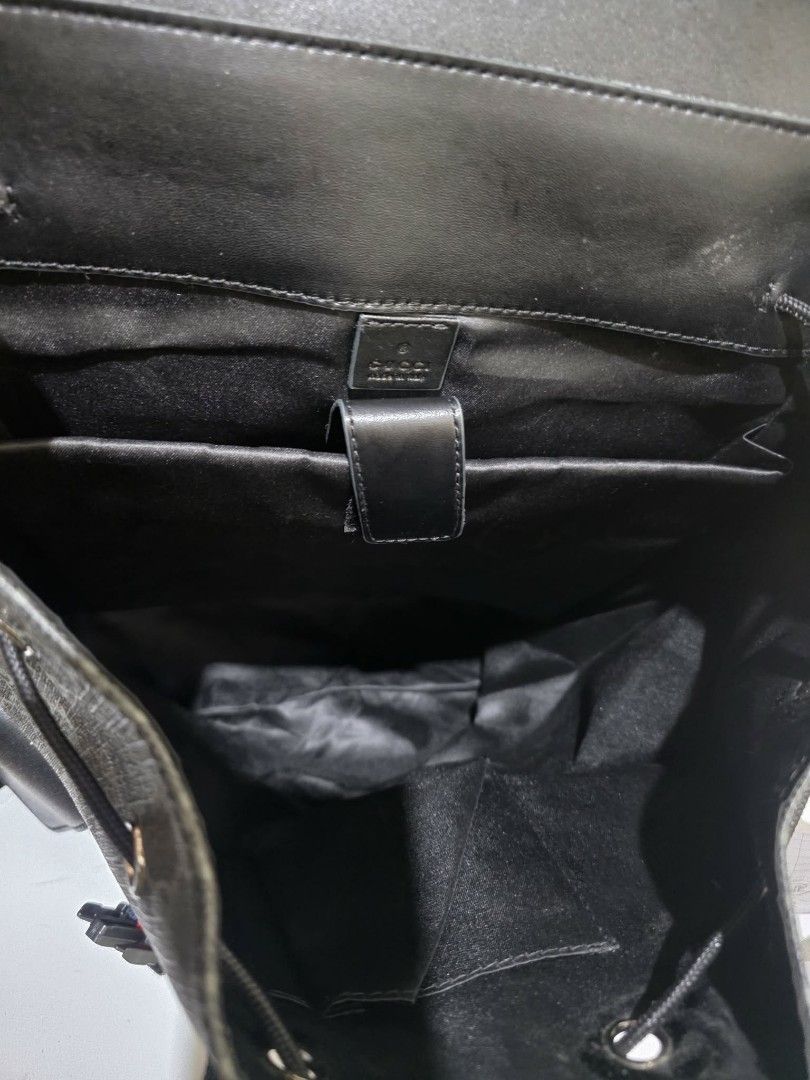 Gucci GG Supreme Monogram Backpack (Category: Luxury Bags & Wallets) located in Batangas. Submitted by venus232nd (Listing ID 1448602420, Image 2). Description: - Gucci backpack - Classic GG Supreme canvas with black leather trim - Drawstring closure under flap with buckle straps - Convenient side pockets - Adjustable padded shoulder straps for comfort - Multiple interior compartments for organization - Serial number visible inside for authentici