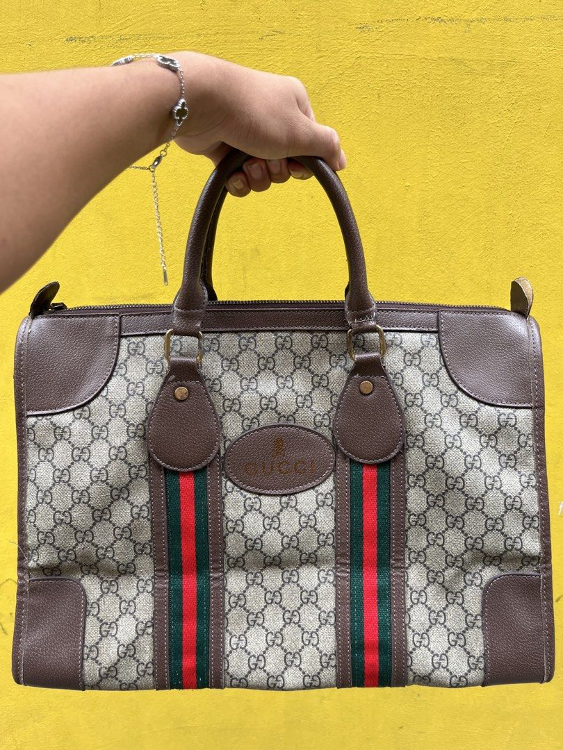 GUCCI MONOGRAM OPHIDIA DUFFLE BAG (Category: Luxury Bags & Wallets) located in Manila. Submitted by aihzenbalt91094 (Listing ID 1448523032, Image 1). Description: - WITH TAG - GOOD CONDI - ISSUE : RUSTS ON HARDWARE - CLAIM 500.