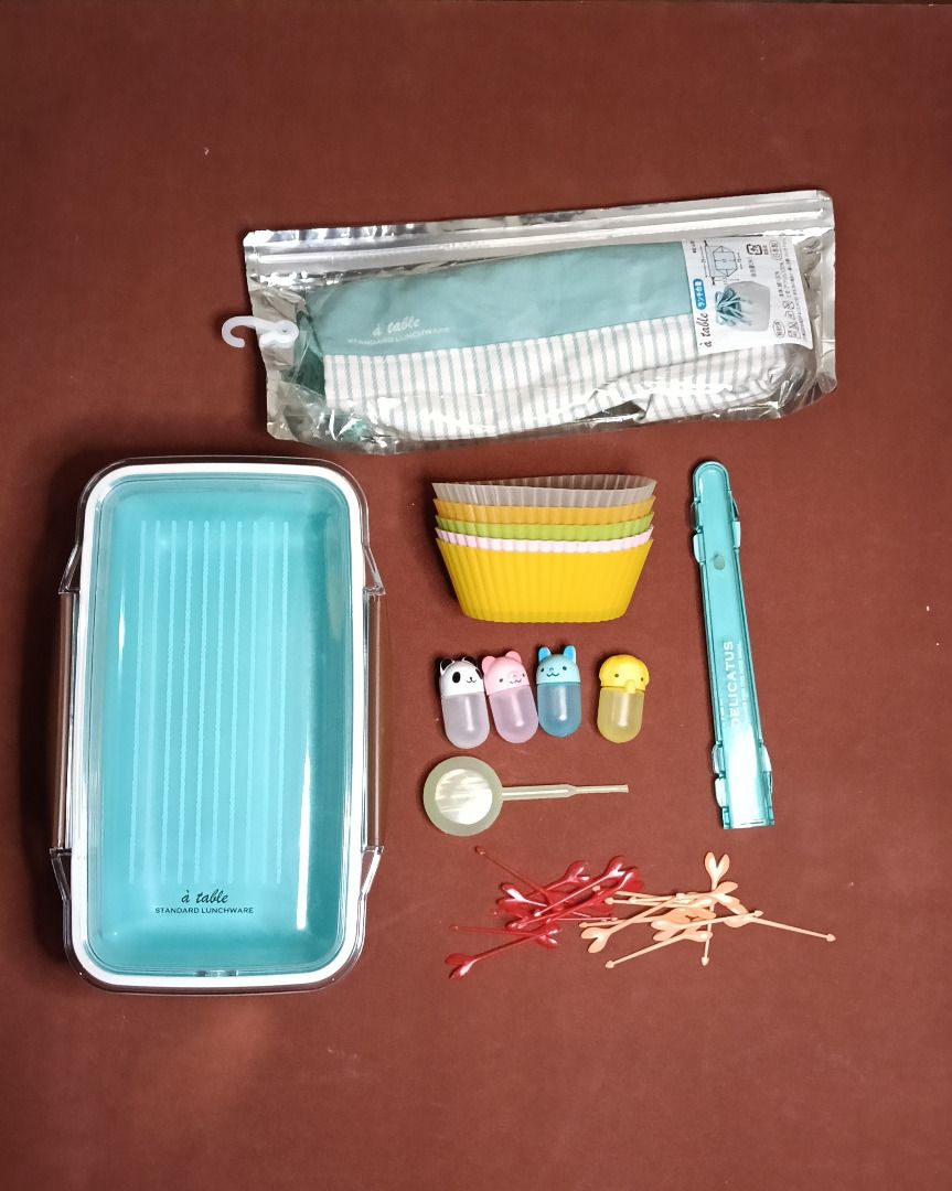 Japanese Bento Lunch Box Set (Category: Food Organization & Storage) located in San Juan City. Submitted by vt_horang (Listing ID 1448596438, Image 1). Description: Inclusions: - 1 Blue Lunch bag - 1 Blue Bento box - 1 Chopsticks case - 4 Silicon reusable food cup - 4 Animal sauce containers + 1 dropper - 18 Heart food picks (9 red, 9 pink).