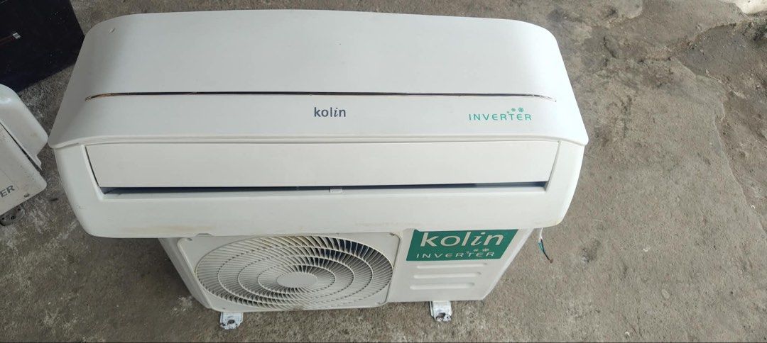 Koln 1HP Inverter Split type Aircon (Category: Air Conditioning and Heating) located in Manila. Submitted by marquezpa52205 (Listing ID 1448602678, Image 1). Description: - White Kolin inverter air conditioner unit - Shows some signs of wear: small scuff on top front edge - Minor marks on the bottom fan grille - White unit with green branding - Ready for a new home.