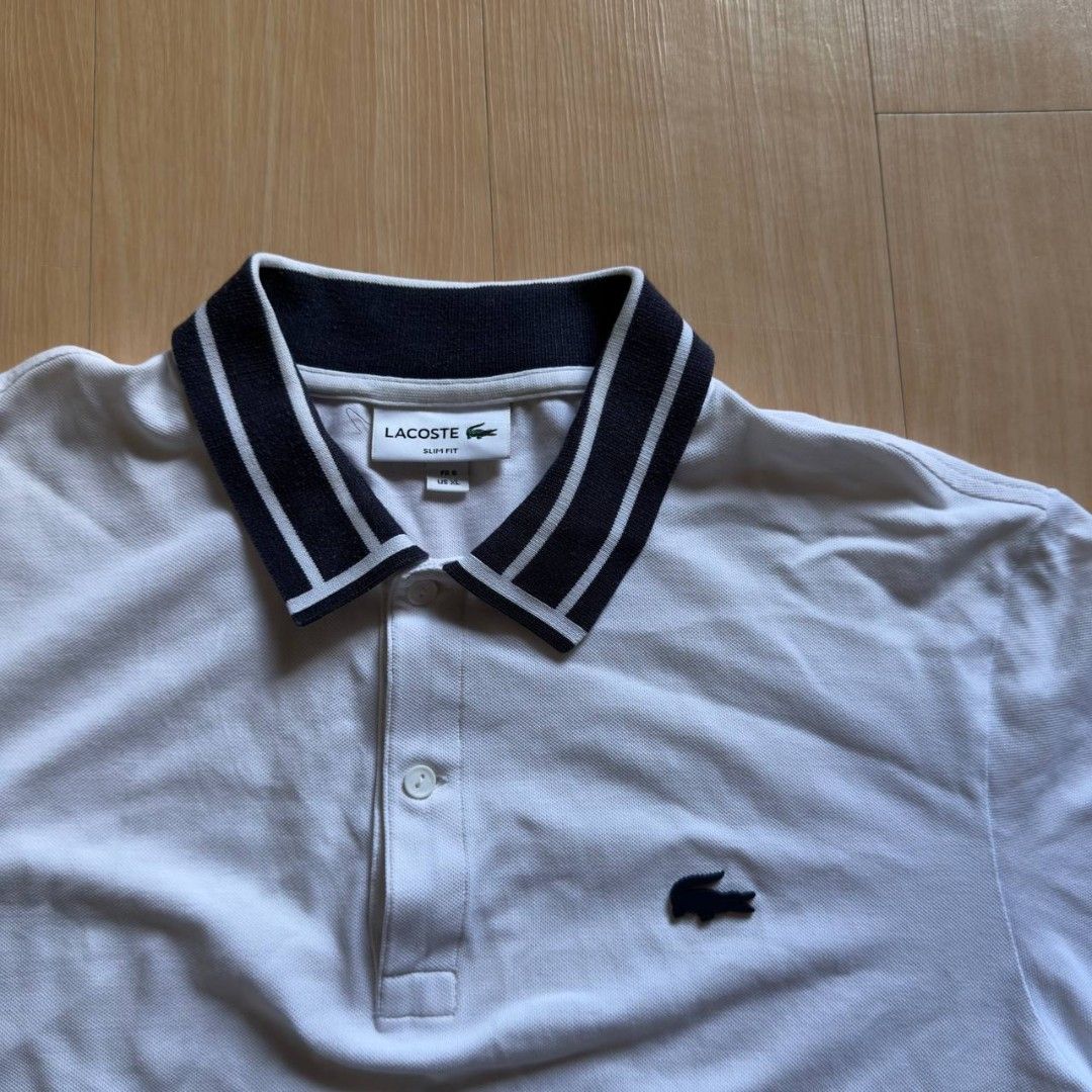LACOSTE POLO SHIRT (Category: Activewear) located in Manila. Submitted by thriftmobbb (Listing ID 1448677827, Image 2). Description: 21x28 NO ISSUE COLOR RATE 9.8/10.