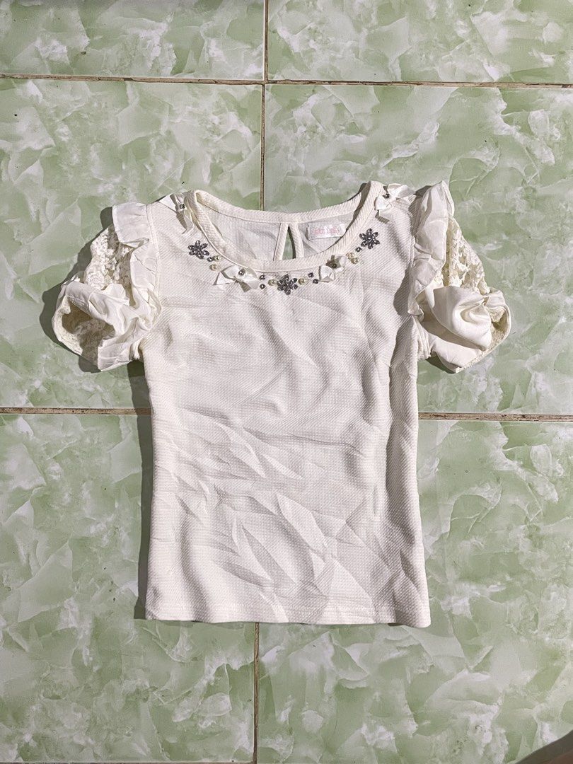 LIZ LISA ANGELIC BIG BOW TOP (Category: Blouses) located in Cagayan de Oro. Submitted by patrickjam03829 (Listing ID 1448630144, Image 1). Description: size small 16width 21.5 length.