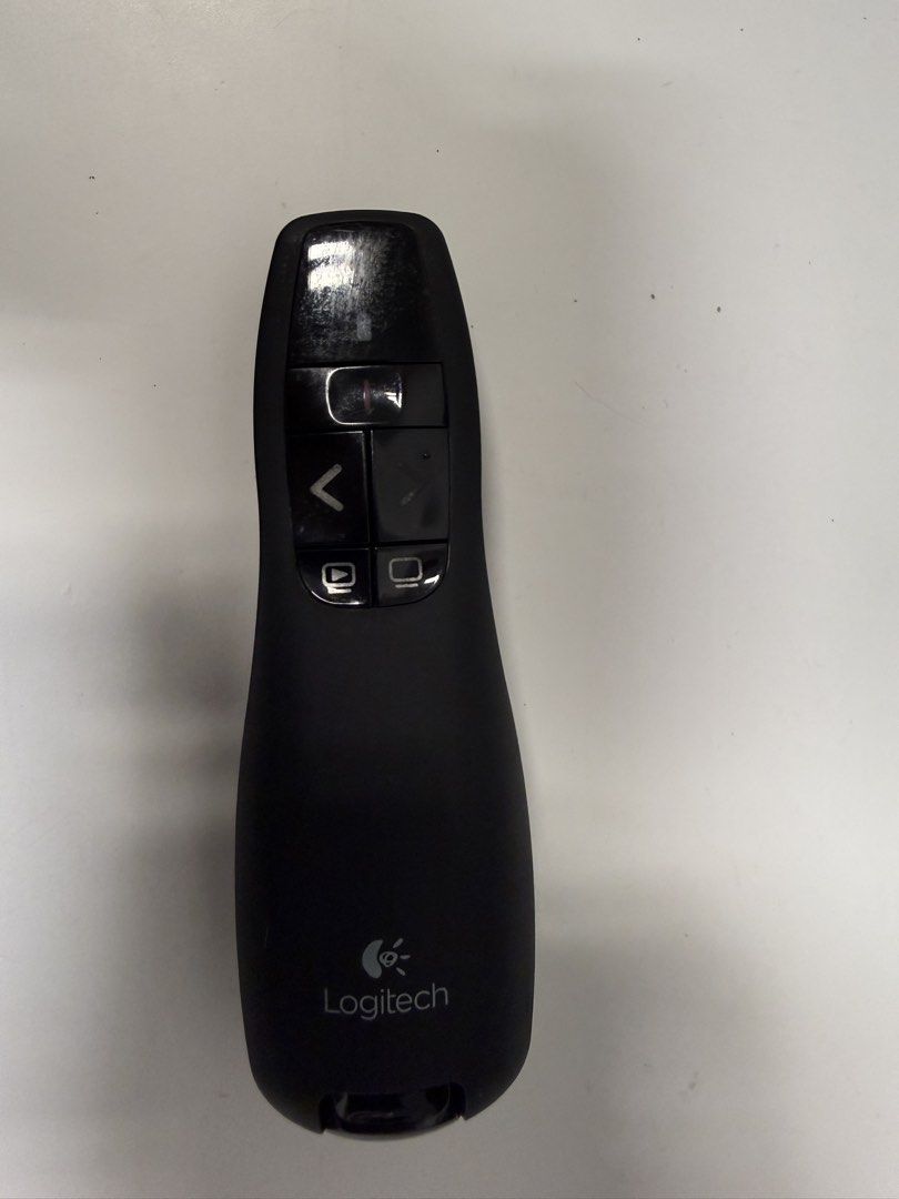 Logitech Wireless Laser Presenter with Pointer (Category: Mouse & Mousepads) located in Singapore. Submitted by sgshopkt (Listing ID 1448611384, Image 1). Description: - Logitech wireless presenter - Built-in laser pointer - Forward, backward, and middle buttons - Ideal for presentations and lectures - Easy to use and portable - In good working condition.