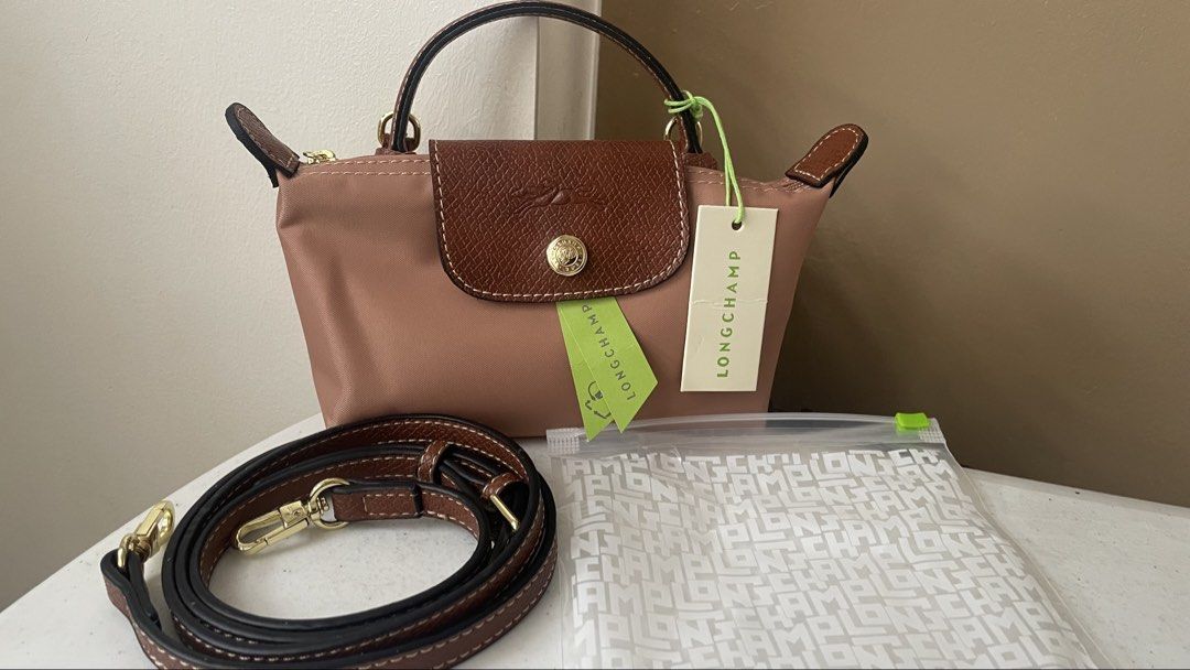 Sale!!!Long Champ Mini Le pliage (Category: Luxury Bags & Wallets) located in Paranaque City. Submitted by mars_eshoppe (Listing ID 1448573573, Image 1). Description: Check the available colors With sling.